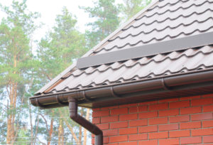 A seamless gutter system installed on a residential home